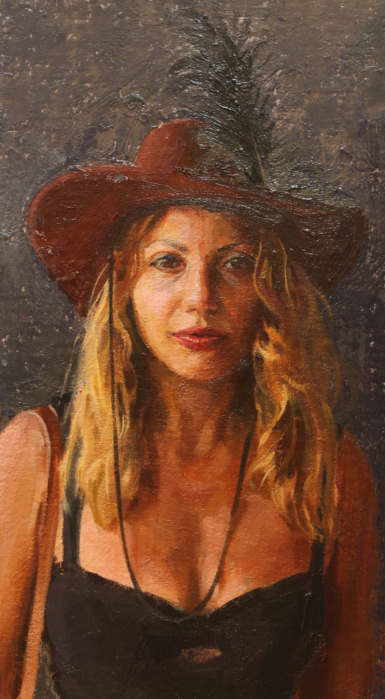 woman in a feathered hat